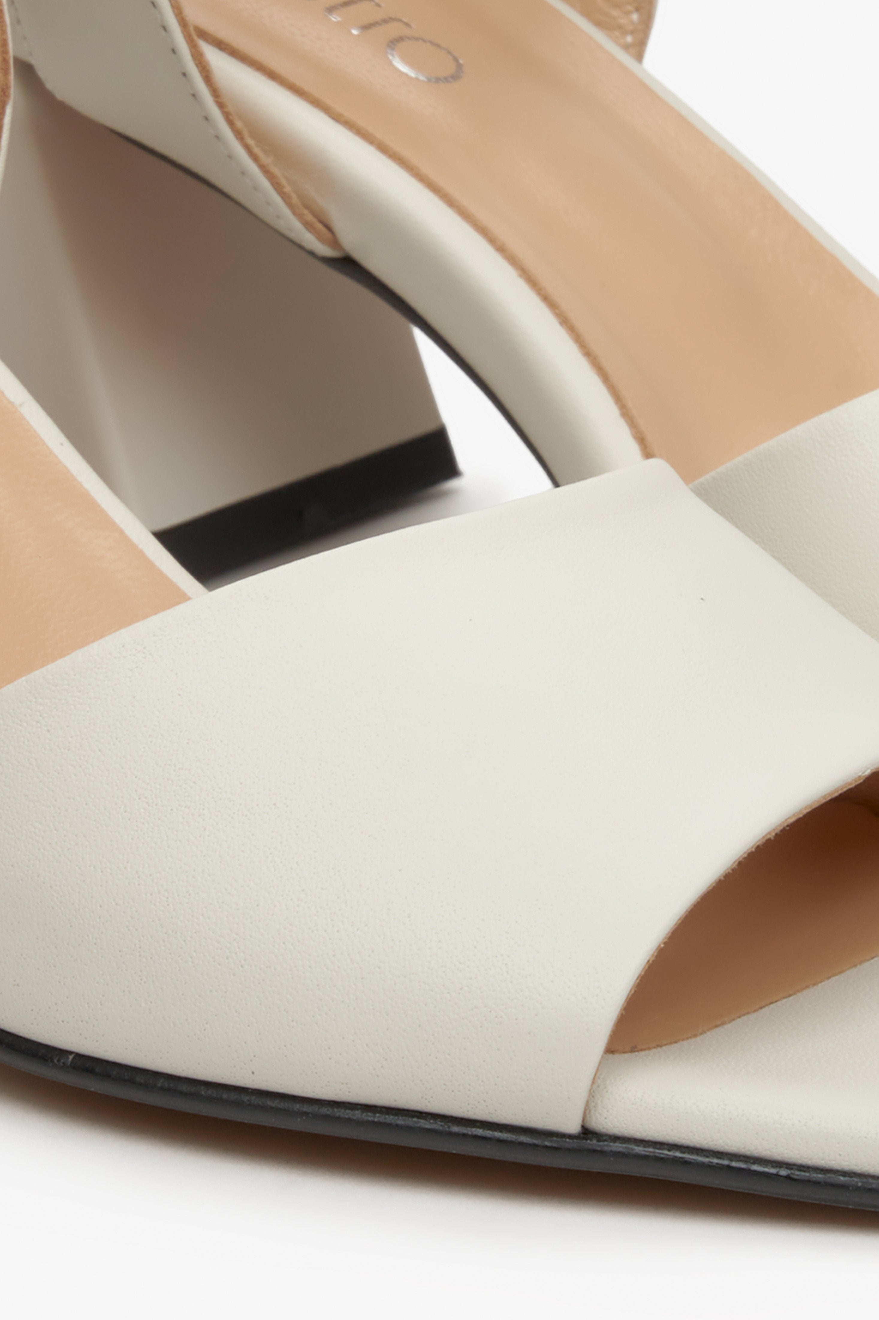 Women's beige leather  heeled sandals by Estro - a close-up on the details.