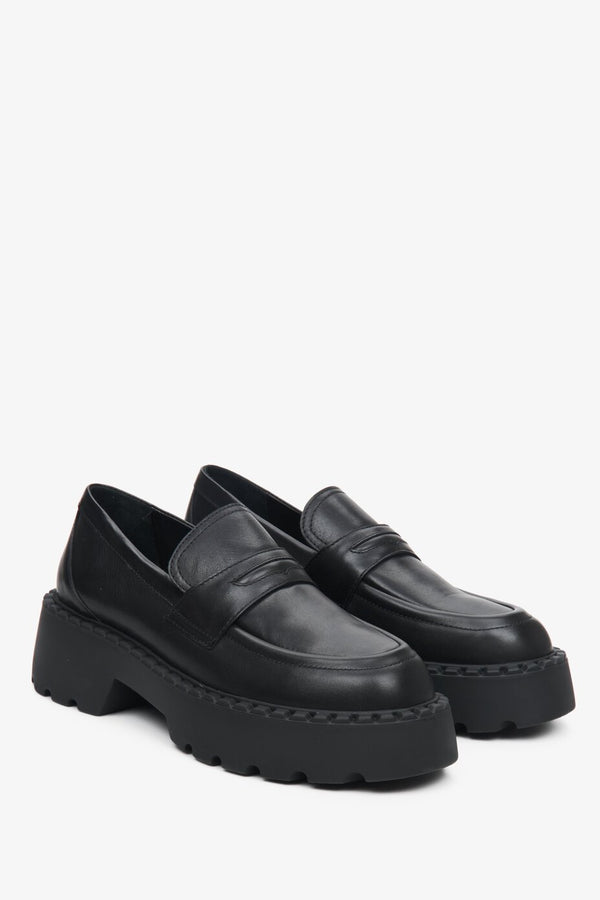 Women's black leather loafers by Estro.