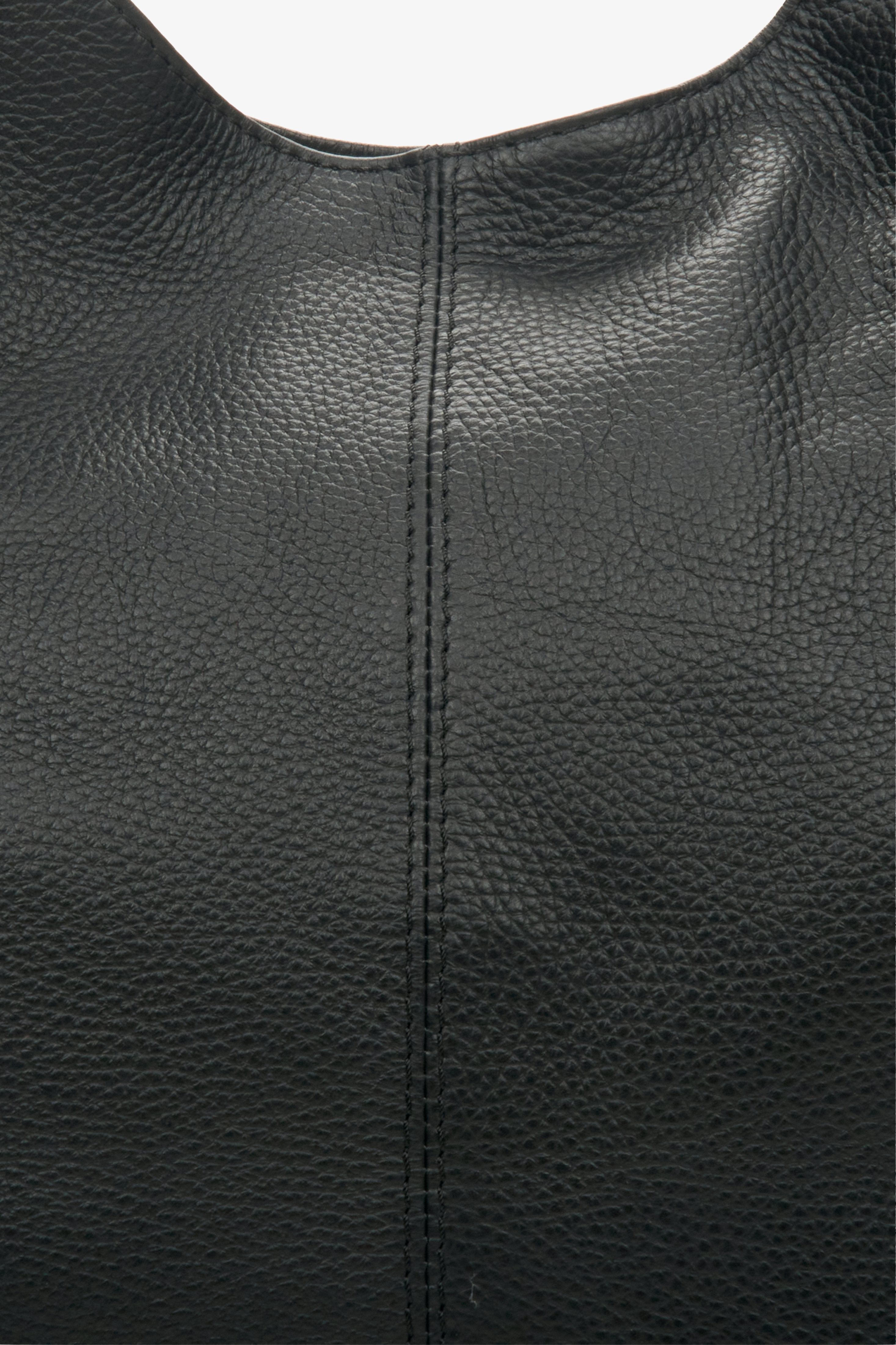 Women's shopper bag in black - a close-up on leather texture.