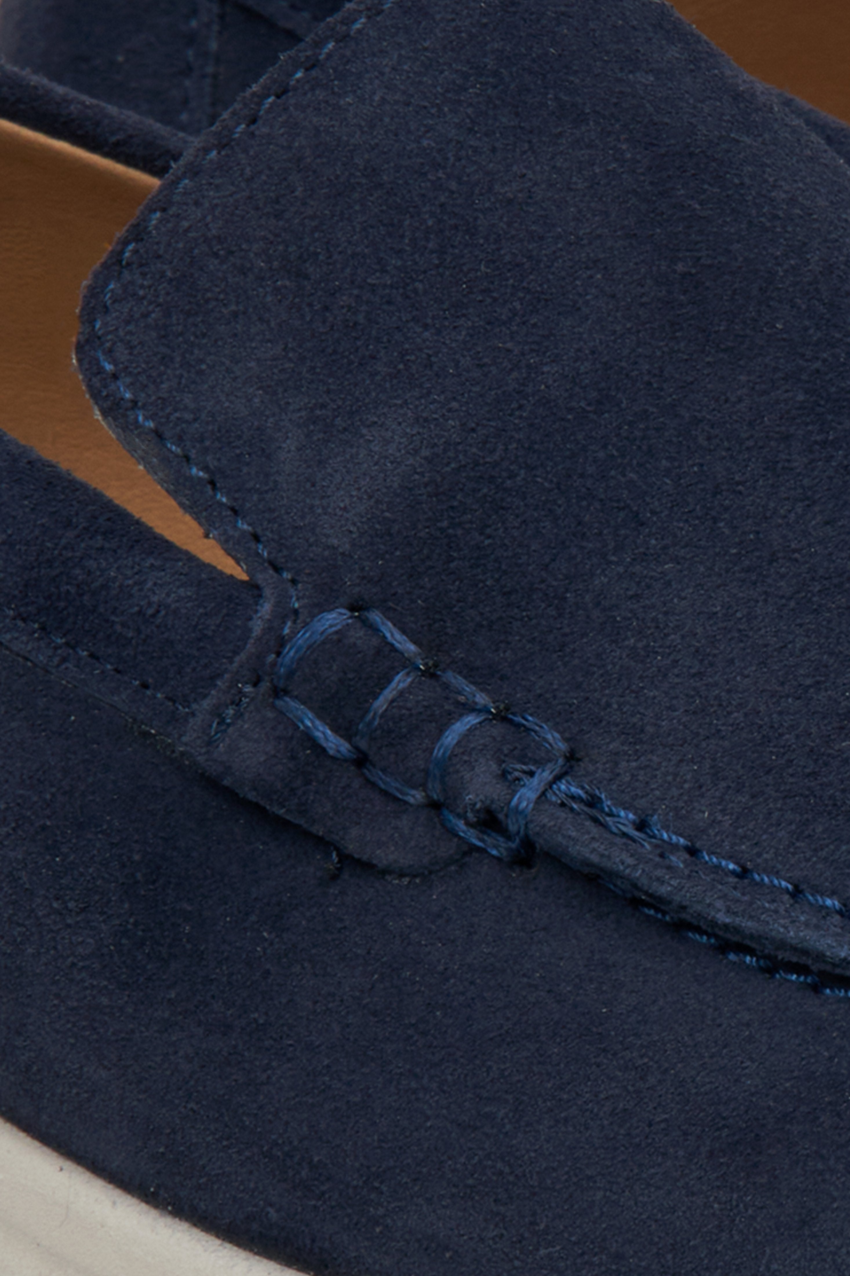 Women's loafers in navy blue velour - close-up on details.