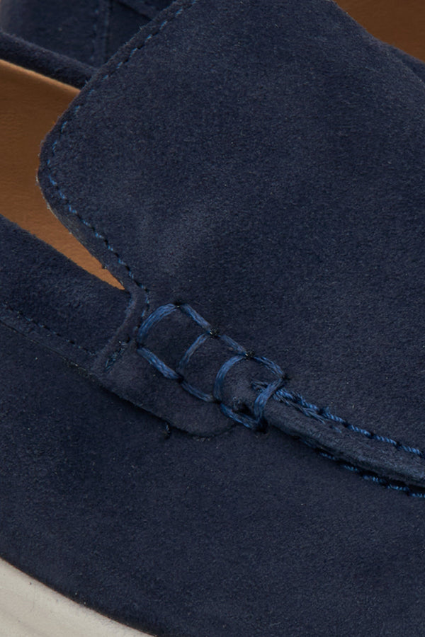 Women's loafers in navy blue velour - close-up on details.