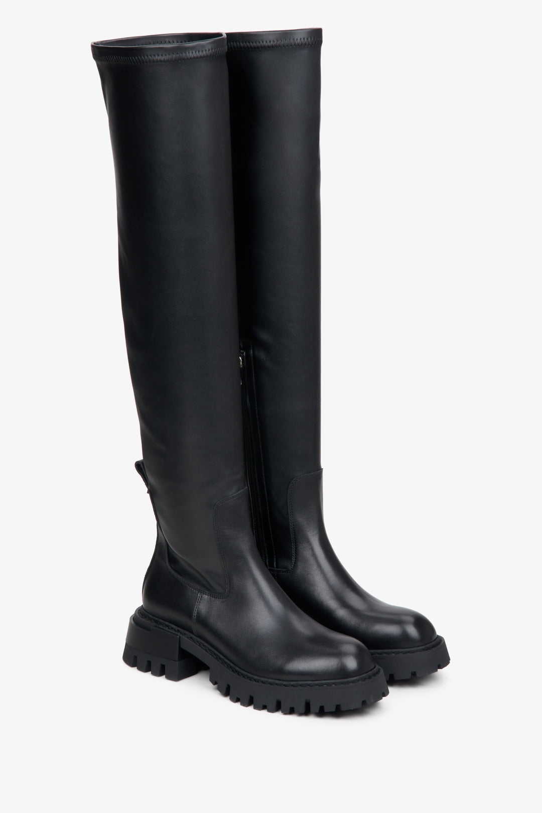 Women's black high-knee boots made of leather with elastic shaft by Estro.