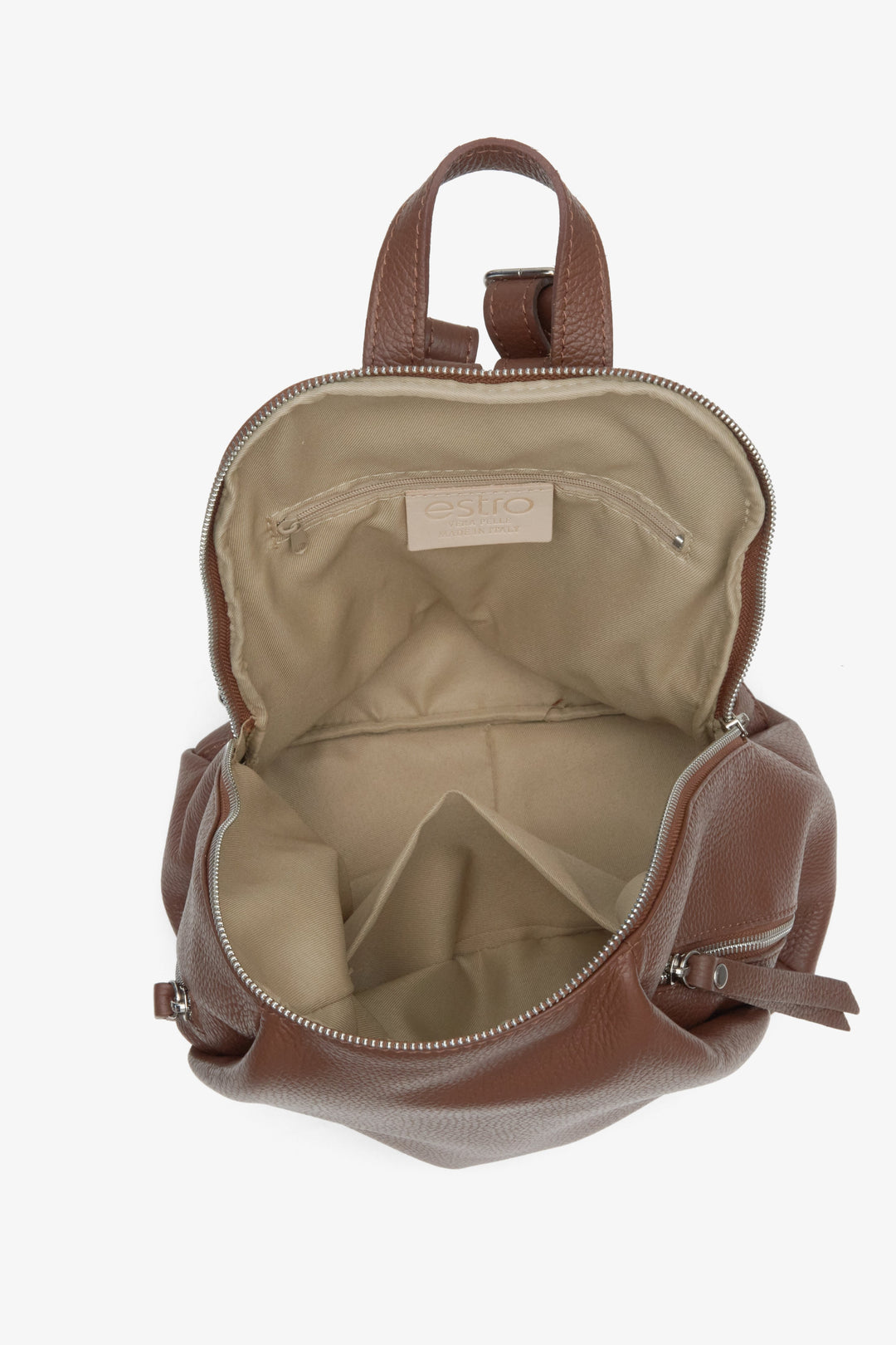 Women's brown leather backpack with silver accents - close-up on the lining.
