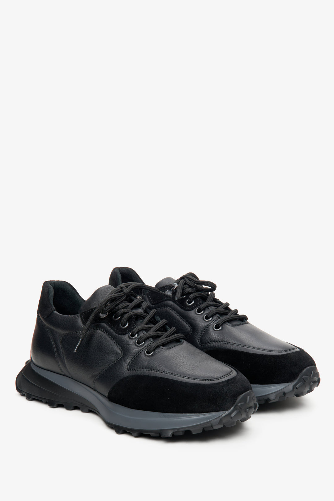 Men's black athletic sneakers made of mixed materials by Estro.