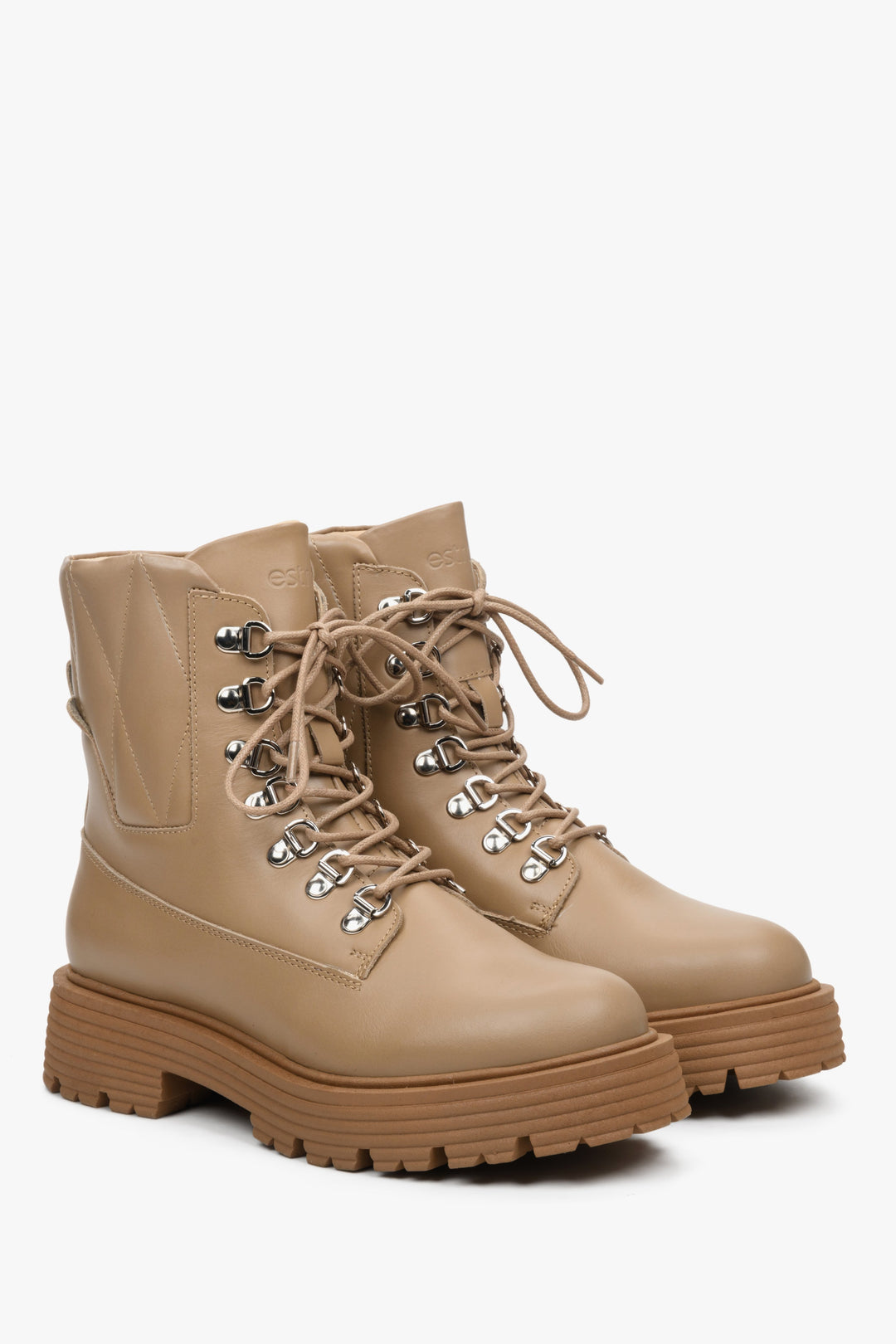 High women's winter boots made of genuine leather in beige color by Estro.