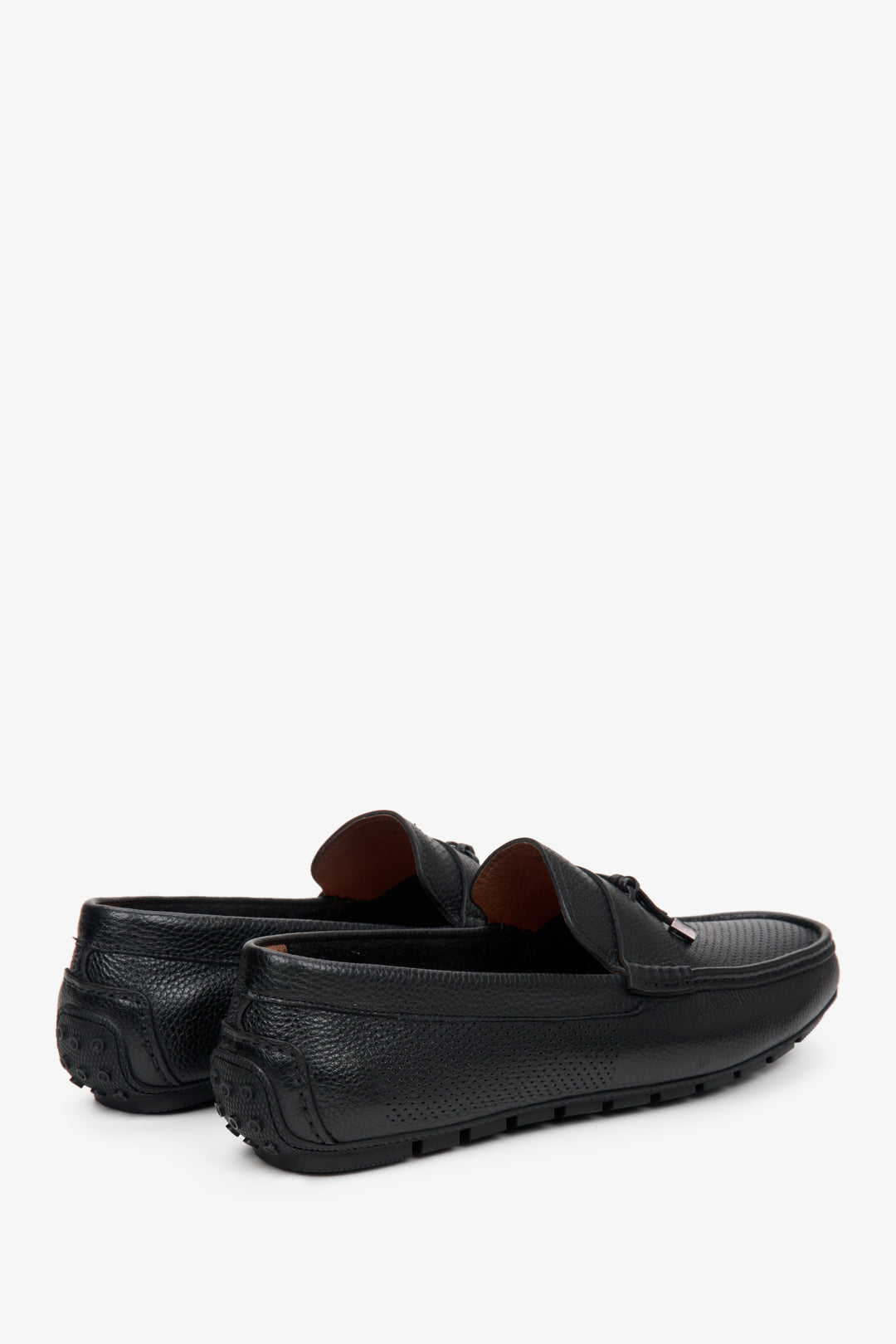 Men's black leather loafers by Estro for fall - close-up on the heel and side seam of the shoes.