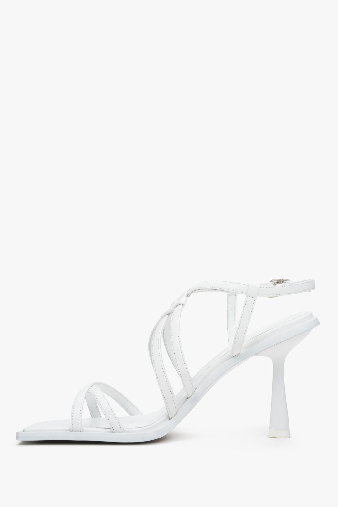 Women's strappy, heeled sandals in white colour - shoe profile.