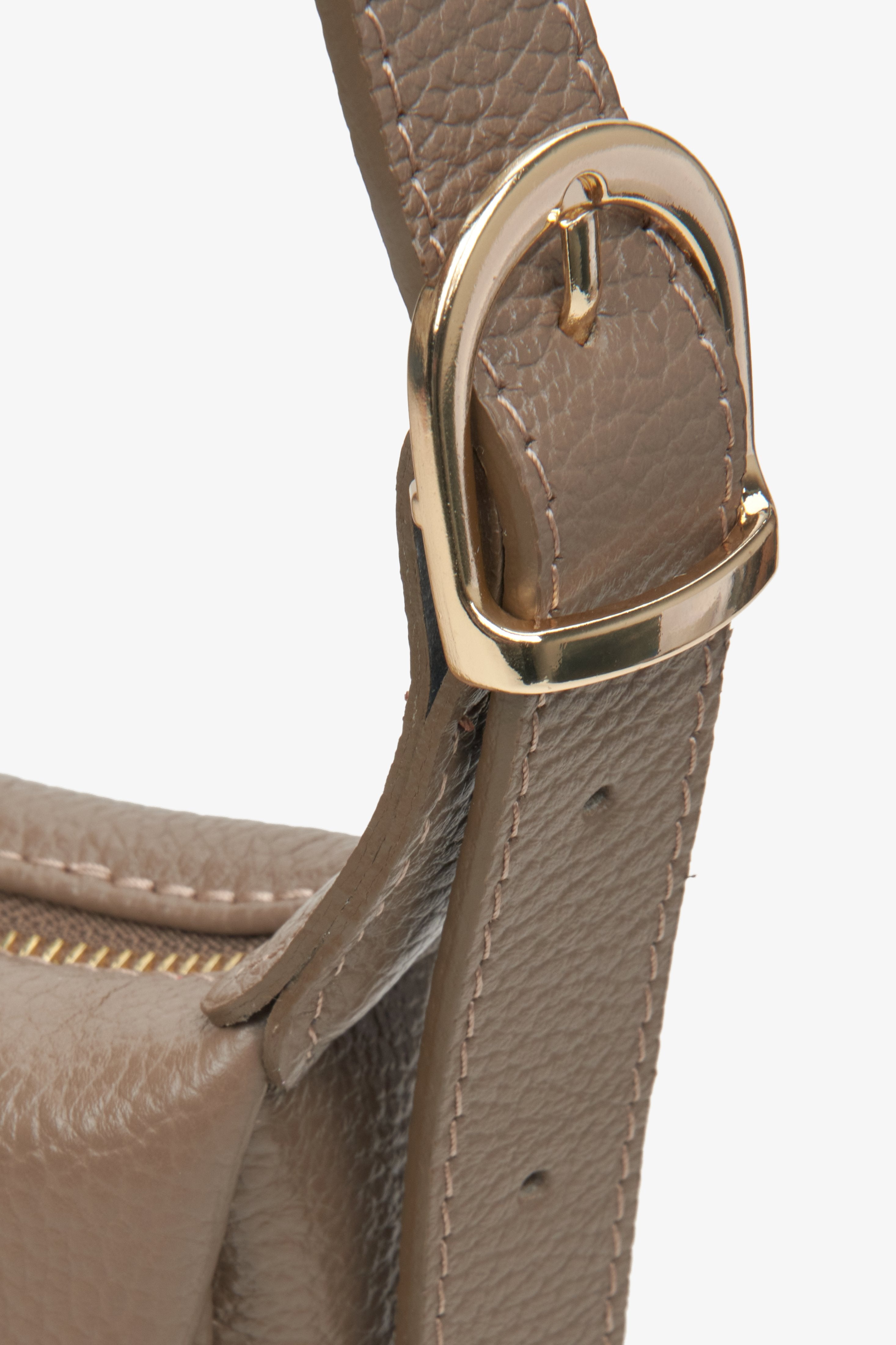 Women's light brown small leather shoulder bag with gold accents by Estro - close-up of the details.