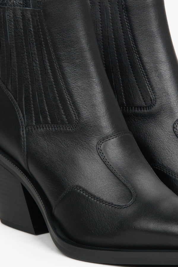 Estro black cowboy boots made of genuine leather - close-up of the details.