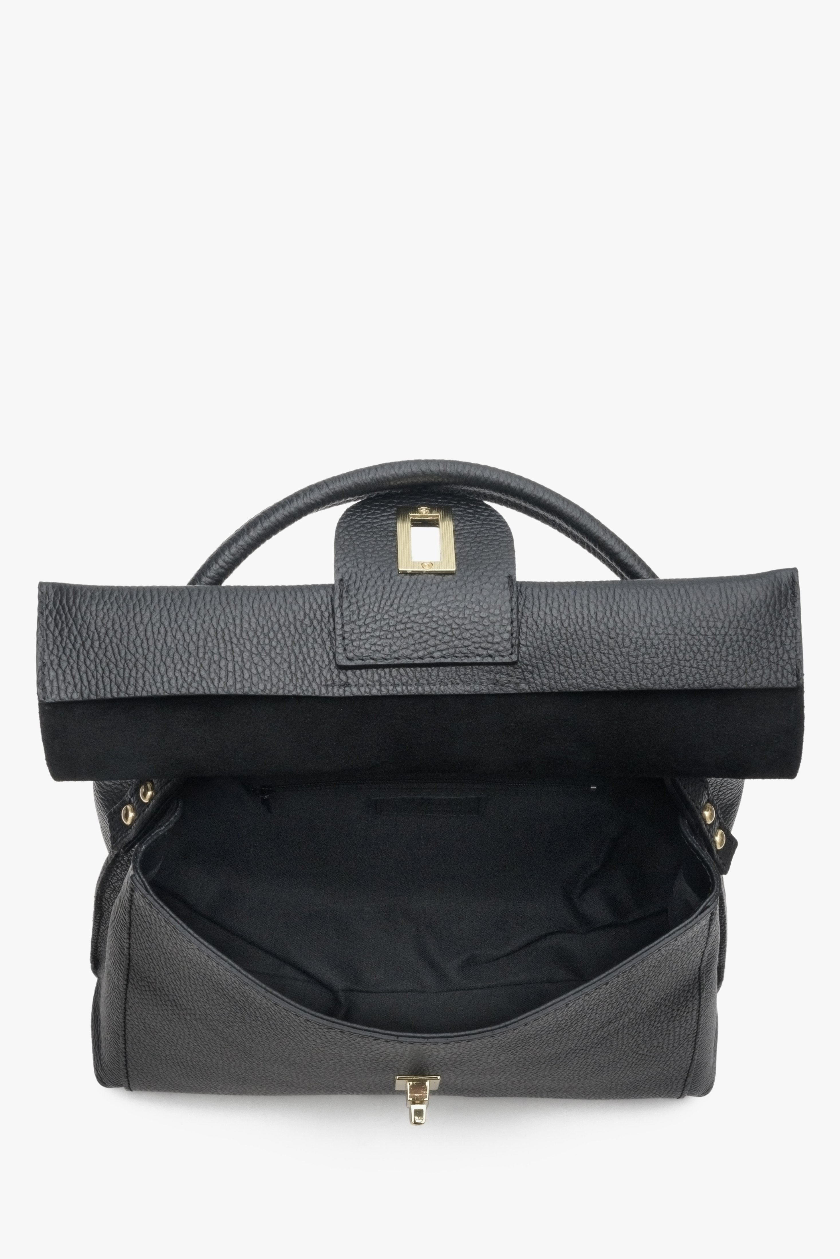 Women's black handbag in a boxy style by Estro - close-up of the interior.