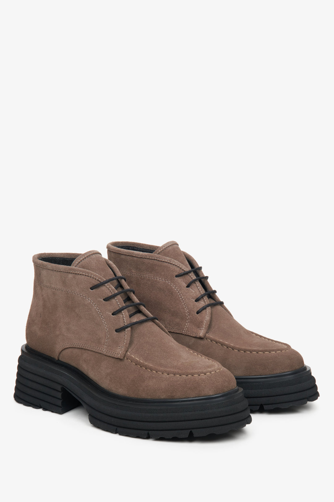 Women's suede brown lace-up boots.
