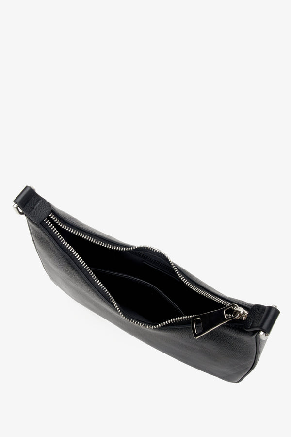 Women's black leather baguette bag - close-up on the interior.