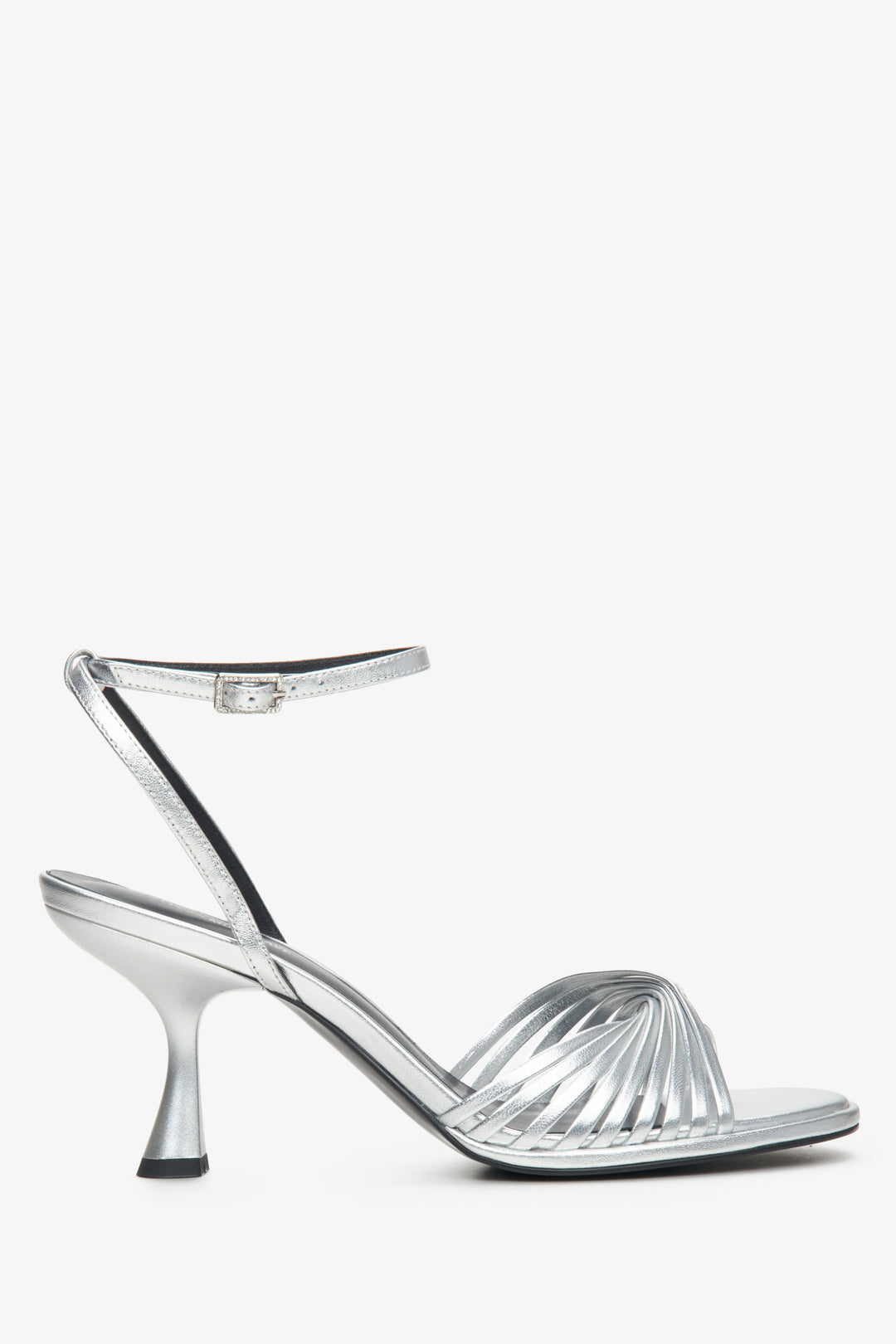 Women's leather sandals with silver heels - side profile of the shoe.