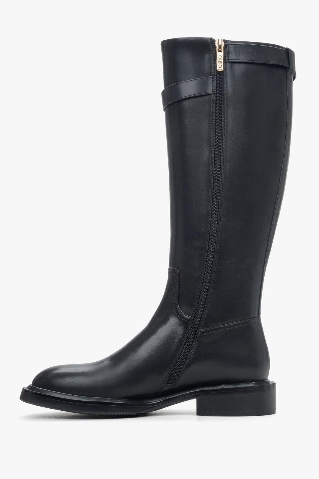 Women's black leather knee-high boots with a decorative strap - shoe profile.
