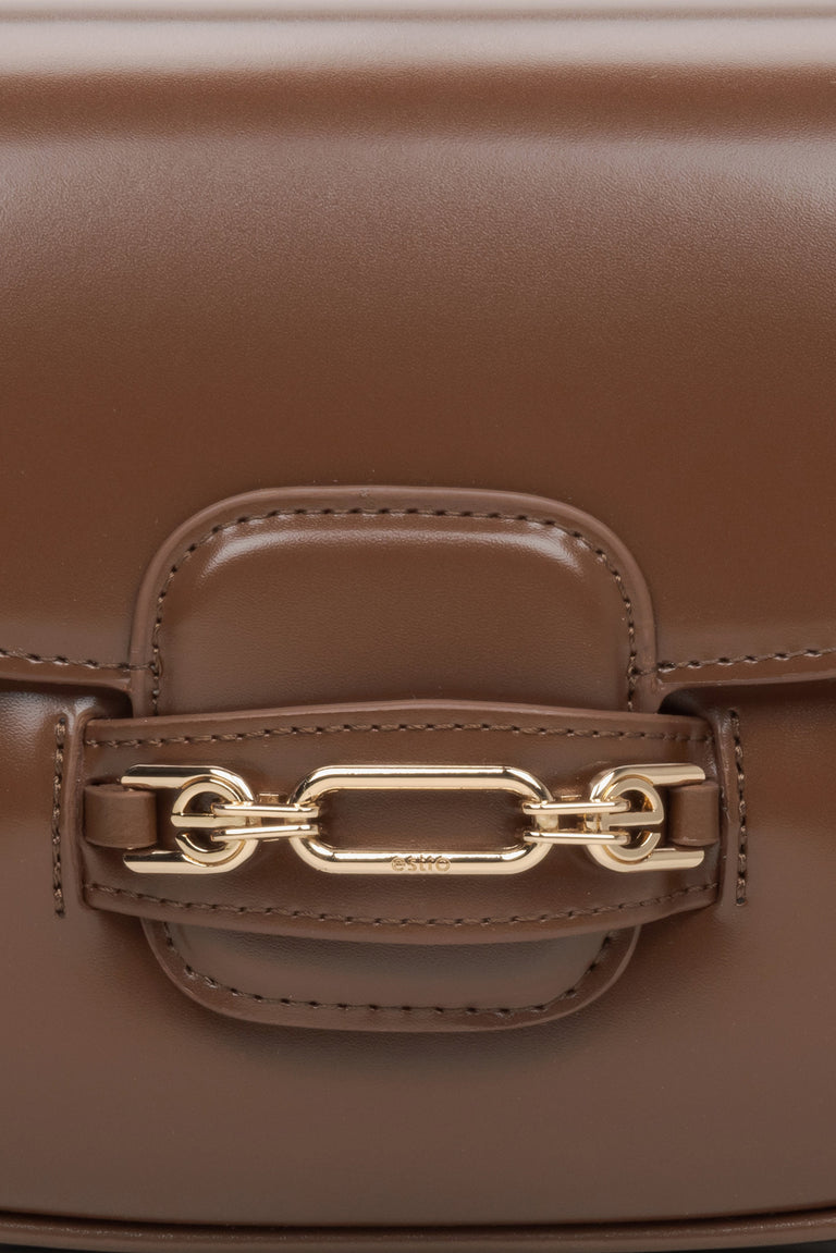 Women's brown leather bag - close-up on the detail.