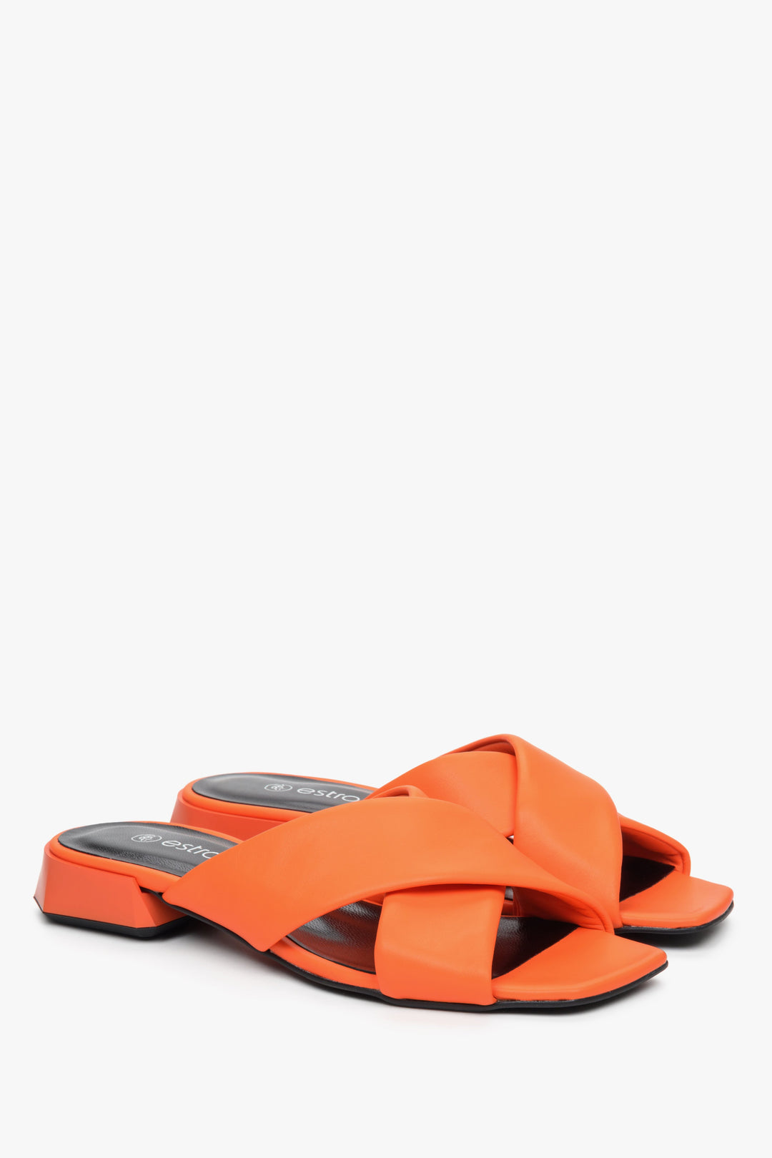 Women's Estro leather mules for summer with cross-straps on a low heel, orange colour.