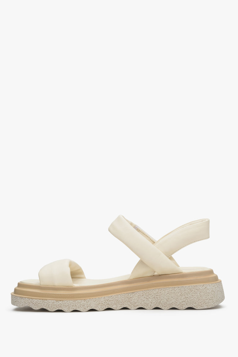 Women's light beige sandals on a flexible chunky platform made of natural leather - profile.