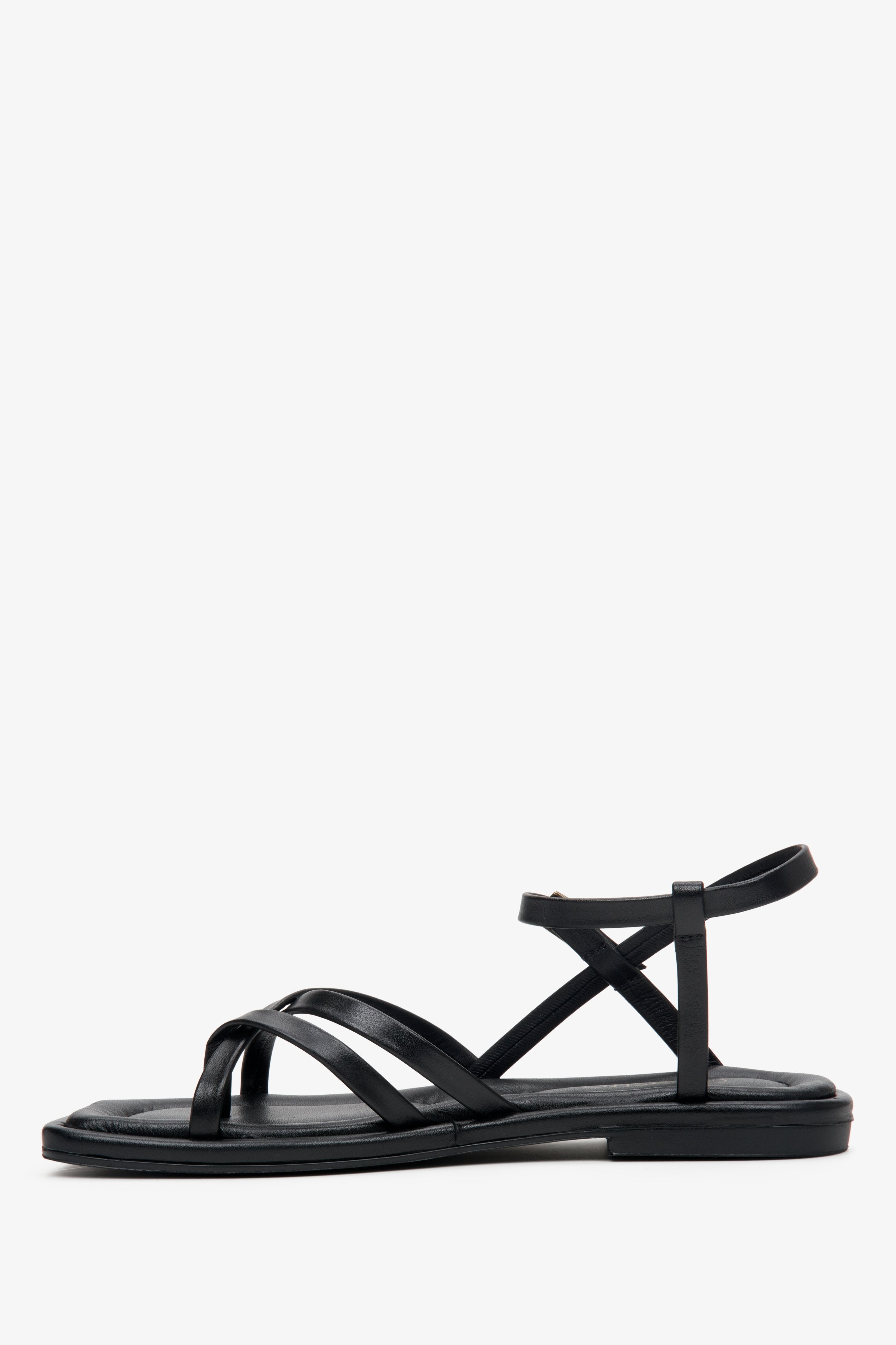 Women's leather lightweight sandals in black with thin cross straps.