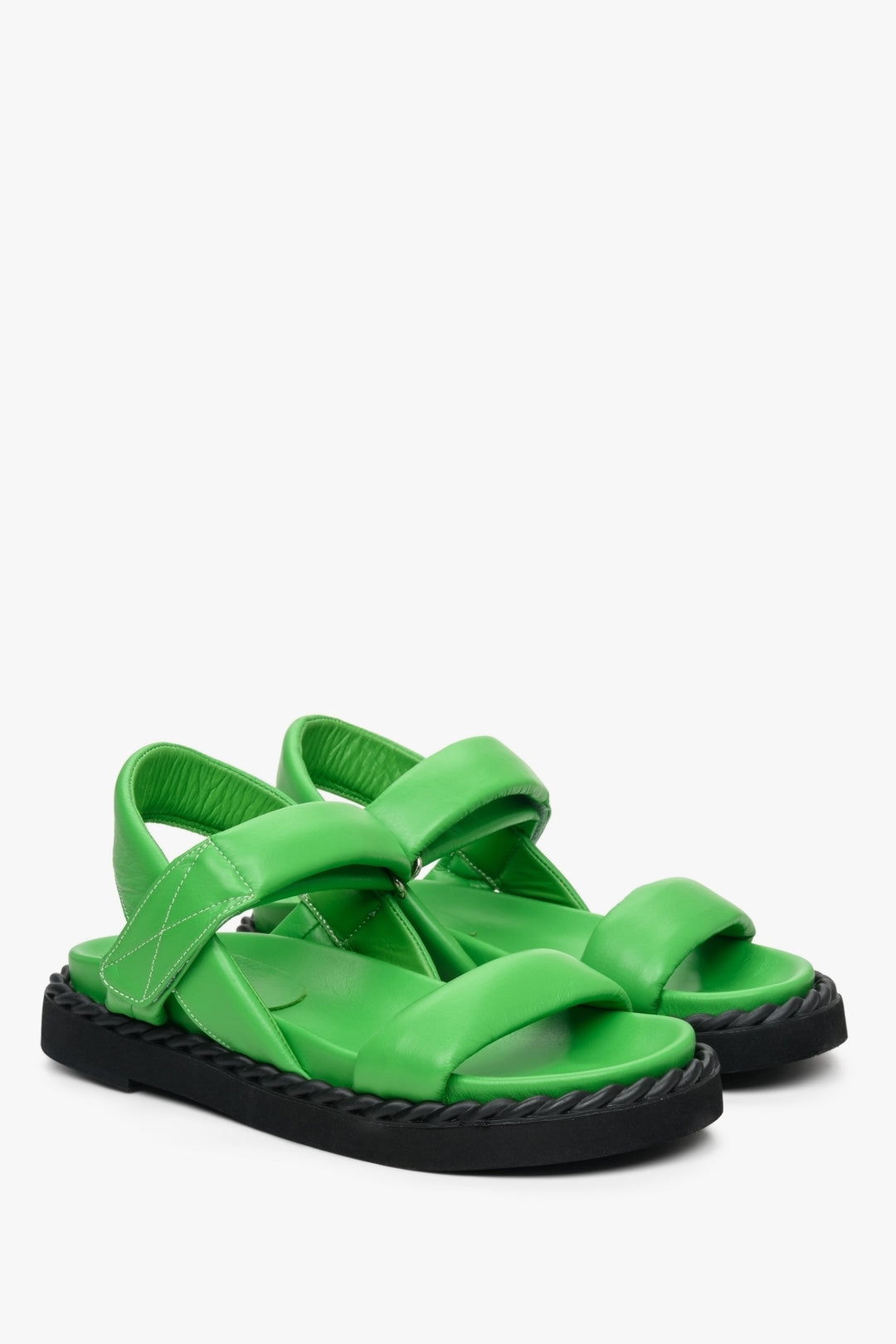 Women's sandals for summer in green colour made of natural leather on a comfortable sole.