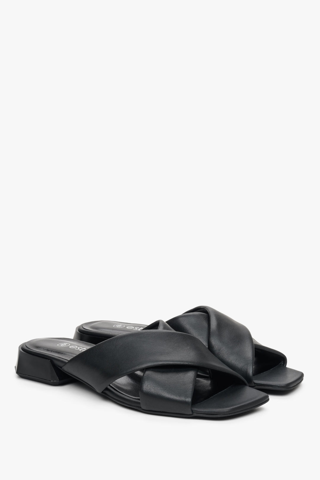 Women's Estro leather mules for summer with cross-straps on a low heel, black colour.