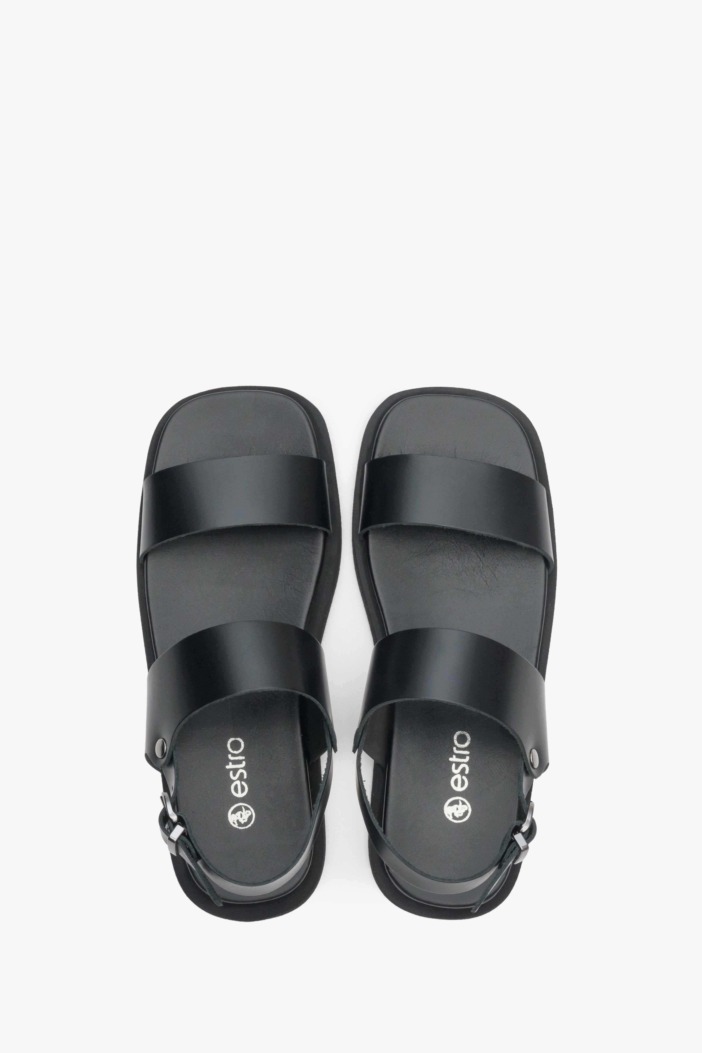 Women's sandals in black on a flat sole Estro - footwear presentation from above.