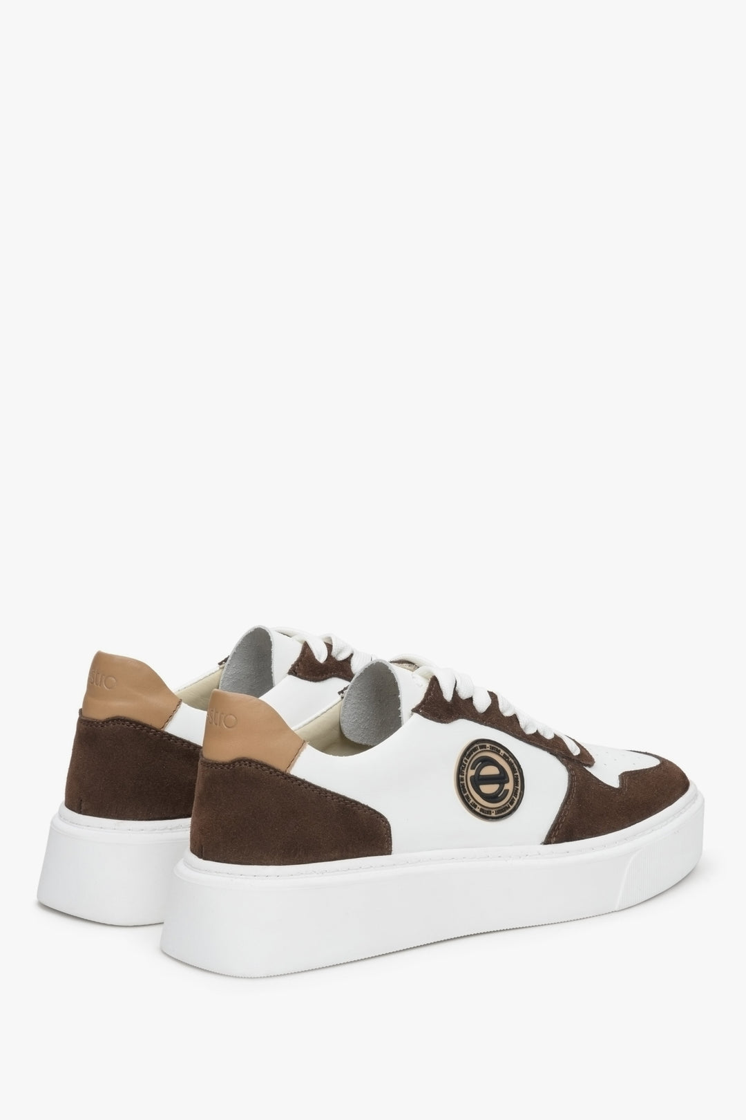 White and brown soft and comfortable Estro women's sneakers in leather and velour - close-up of the side seam and heel counter.