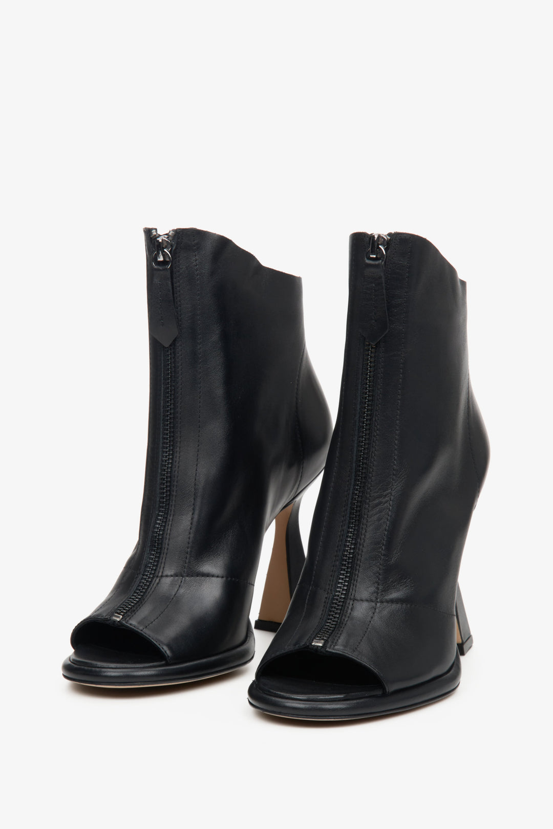 Women's heeled ankle boots made of natural leather in black with an open toe.
