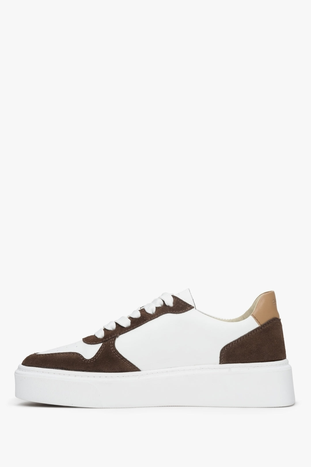 Women's sneakers made of combined materials, leather and velour in a shade of white and brown.