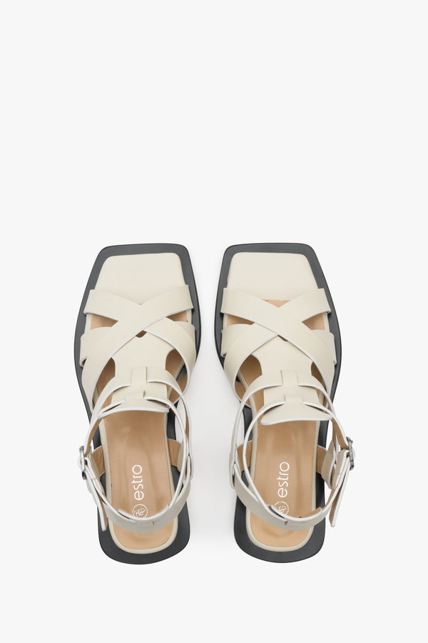 Women's sandals in white made of natural leather Estro - presentation of footwear from above.