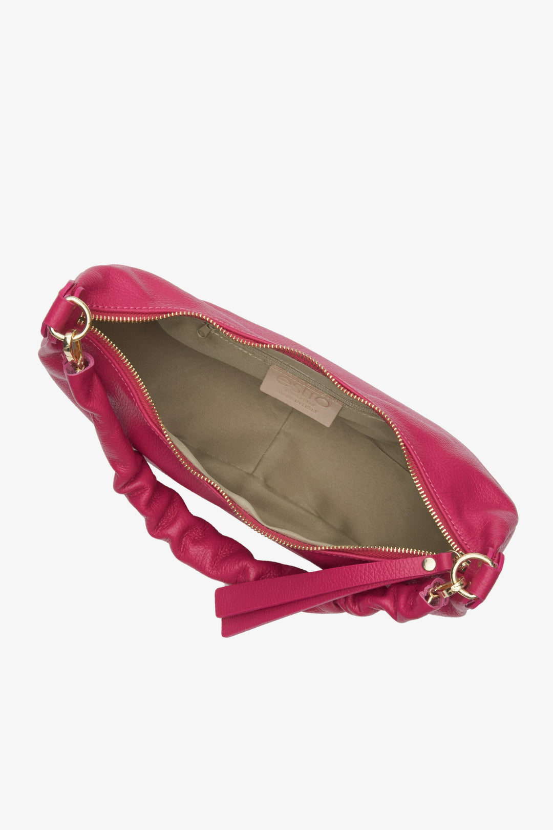 Stylish pink half-moon shpulder bag fastened with a zip - close-up on the lining.