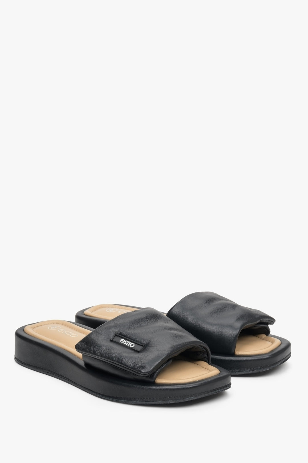 Women's leather slide sandals by Estro in black.