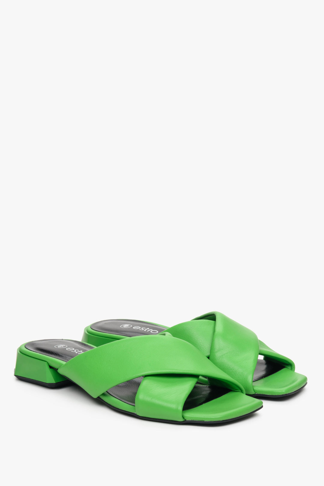 Women's Estro leather mules for summer with cross-straps on a low heel, green colour.