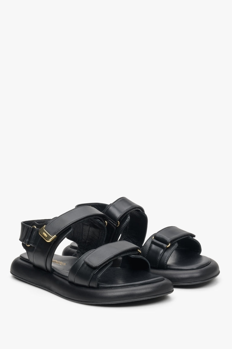 Black leather women's hook-and-loop sandals by Estro - shoe tip presentation.