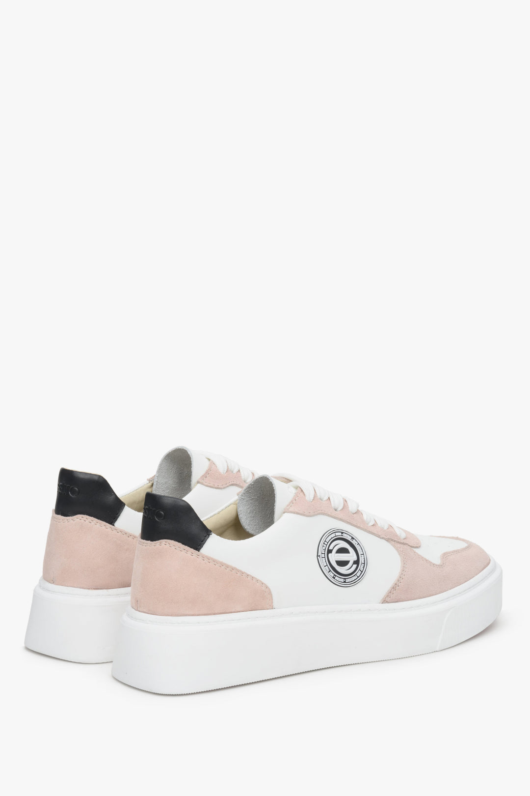 White and pink soft and comfortable Estro women's sneakers in leather and velour - close-up of the side seam and heel counter.