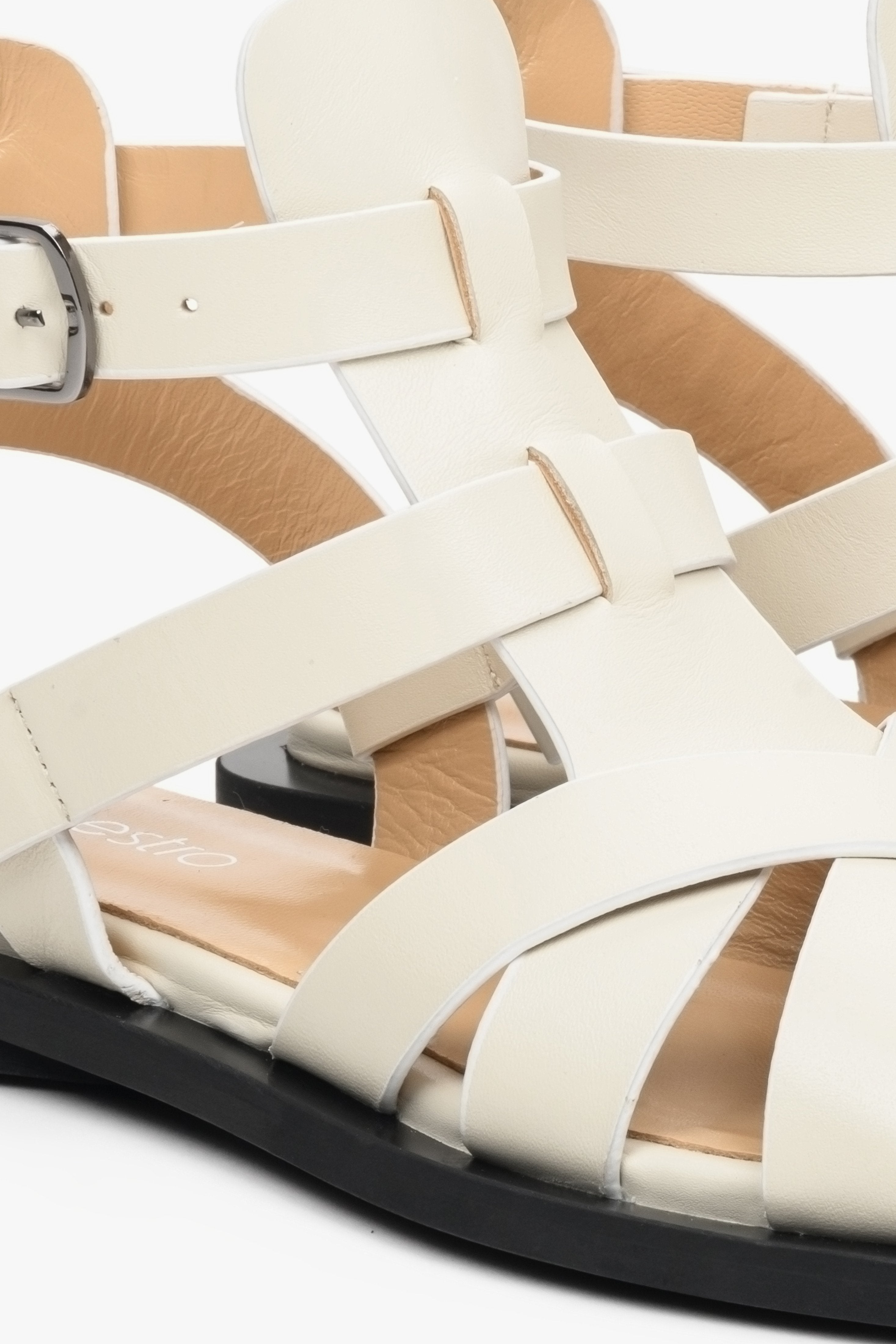 Women's sandals in white made of natural leather Estro - presentation of footwear from above.