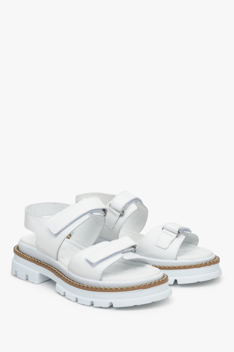 Women's white natural leather sandals by Estro.