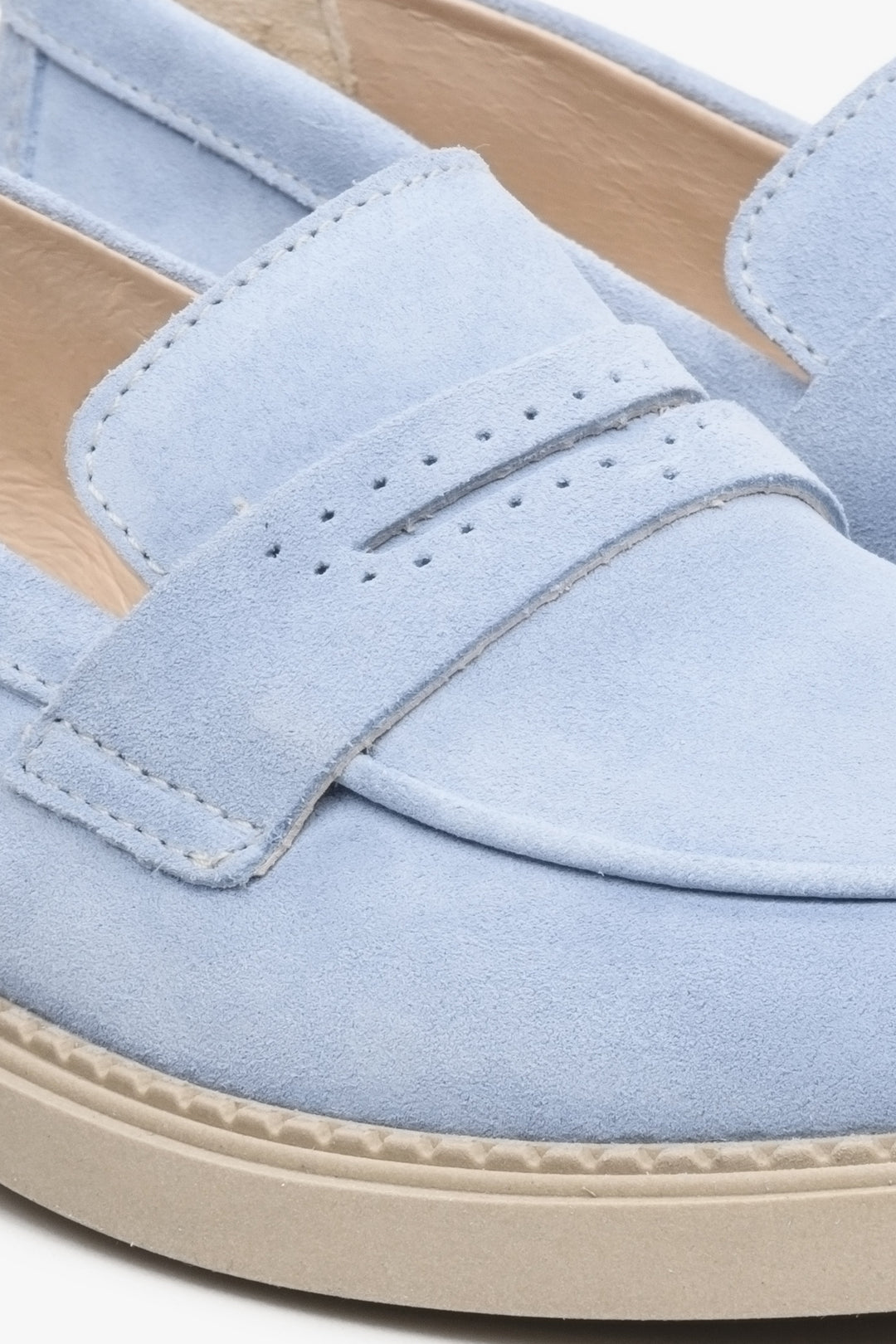 Light blue women's loafers by Estro - a close-up on the sewing line.