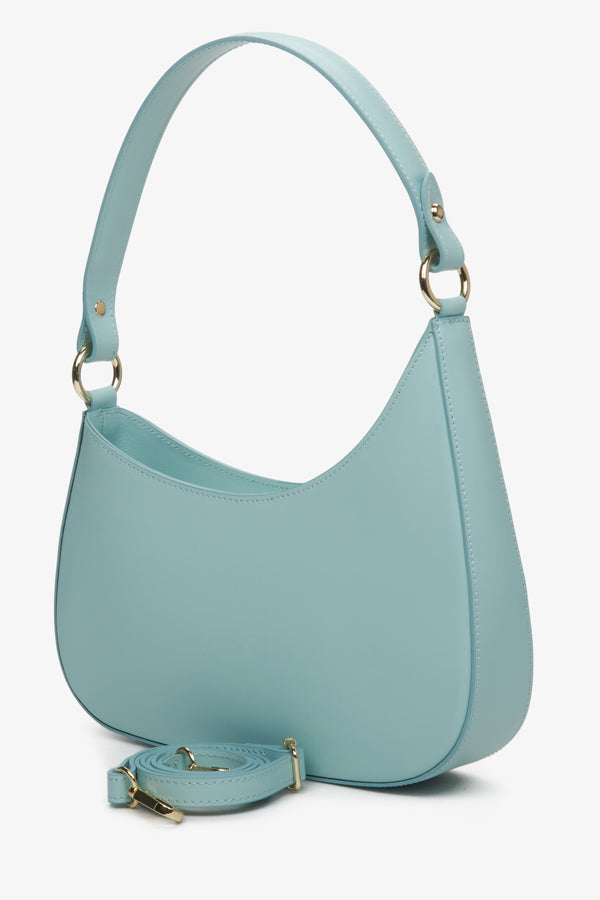 Women's blue Estro shoulder bag with detachable strap.