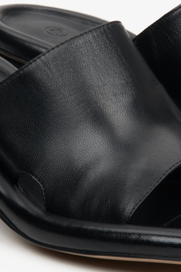 Black leather mules for women on a block heel Estro - close-up of the sewing system.