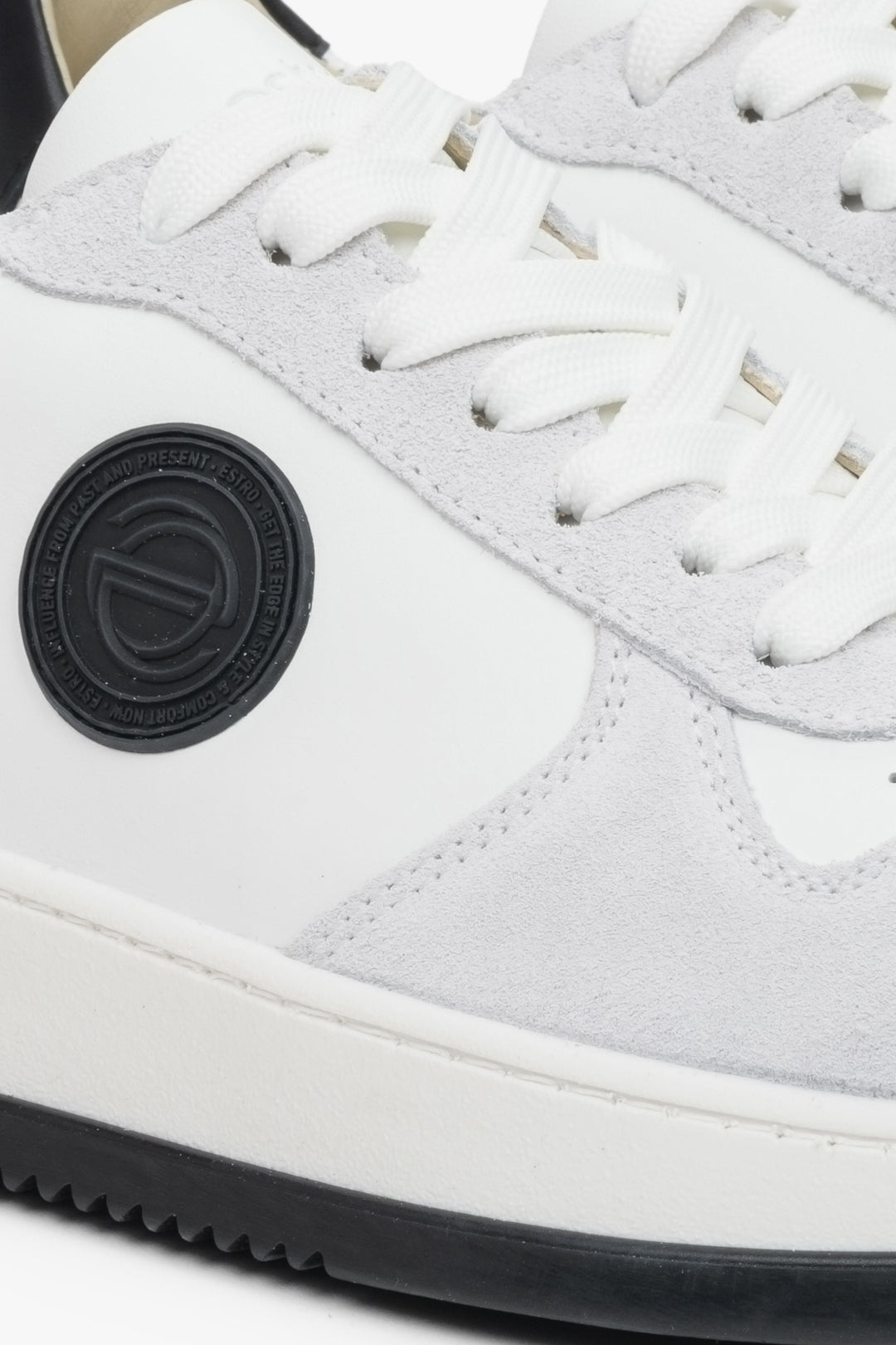 Men's sneakers in suede and leather, grey and white - close-up of details.