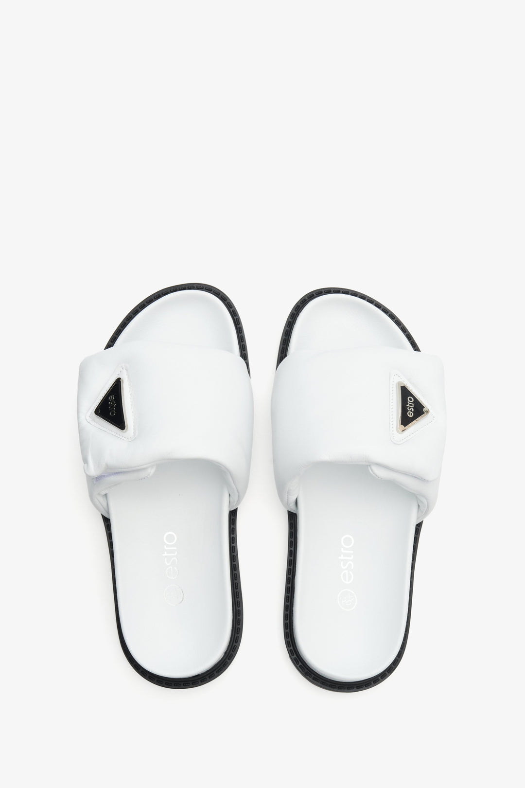 Elegant and comfortable white women's slides made of natural, Italian leather designed by Estro.