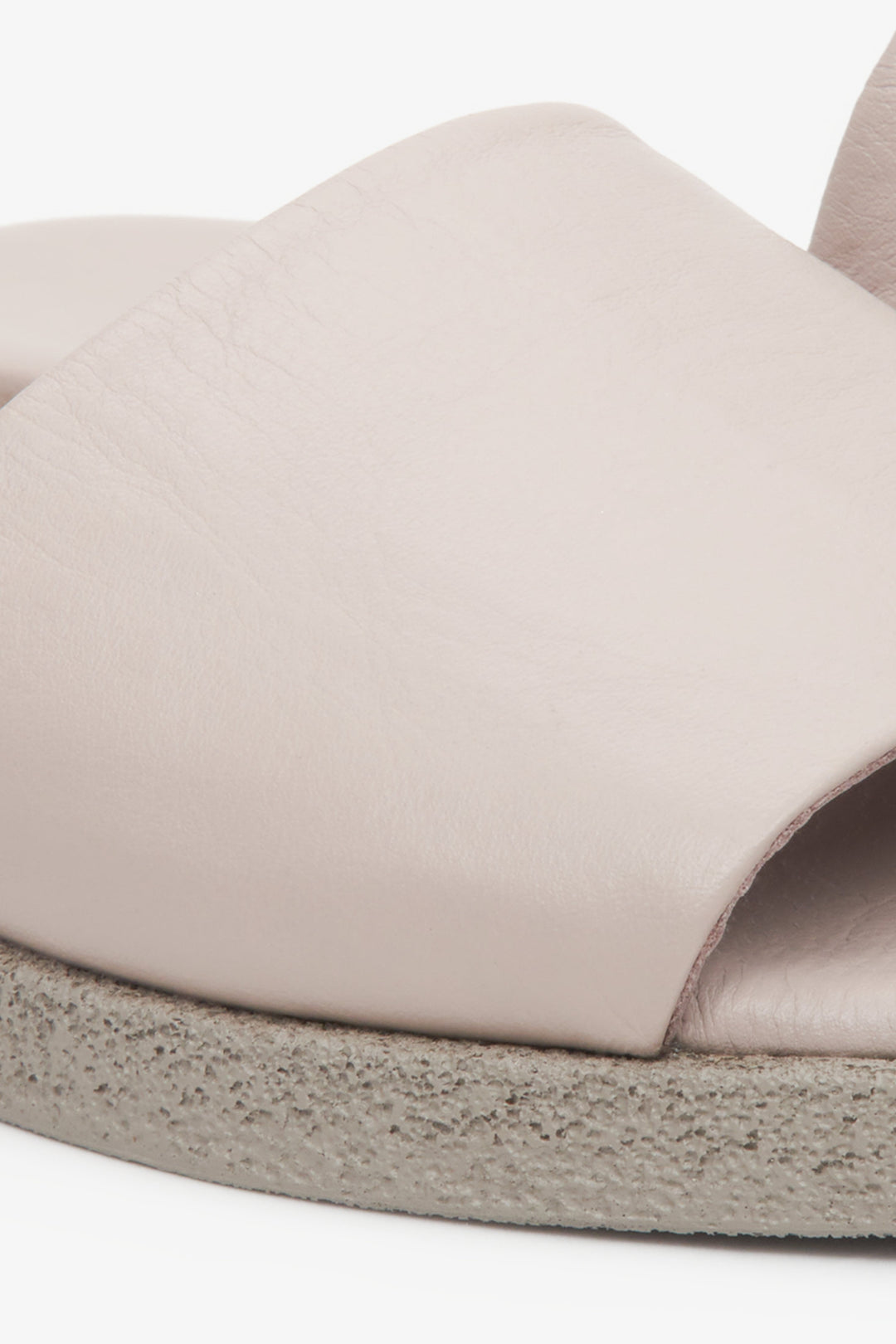 Women's beige Estro flat slides - close up on details.