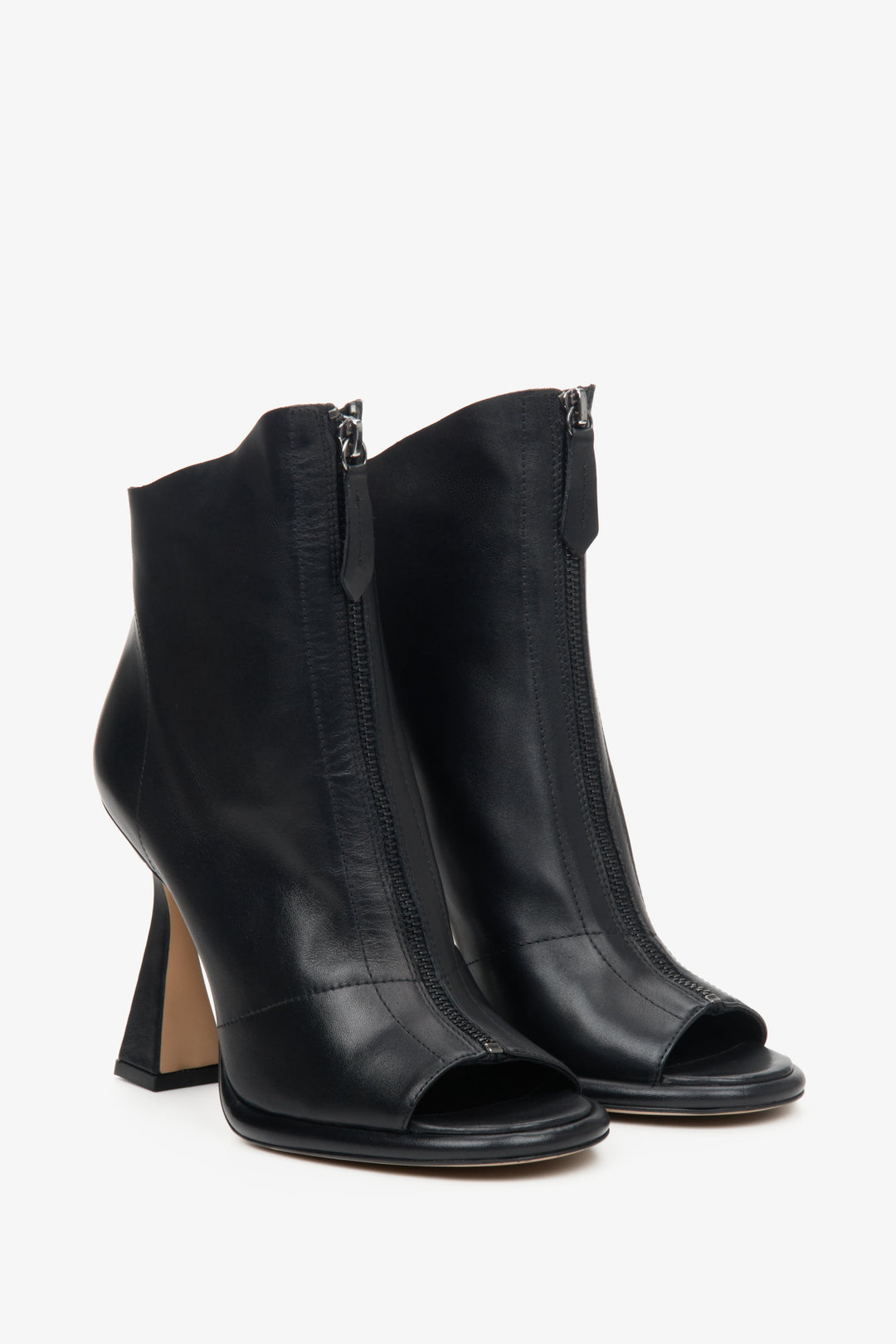 Black leather Estro women's open-toe ankle boots - close-up of the top of the shoes.