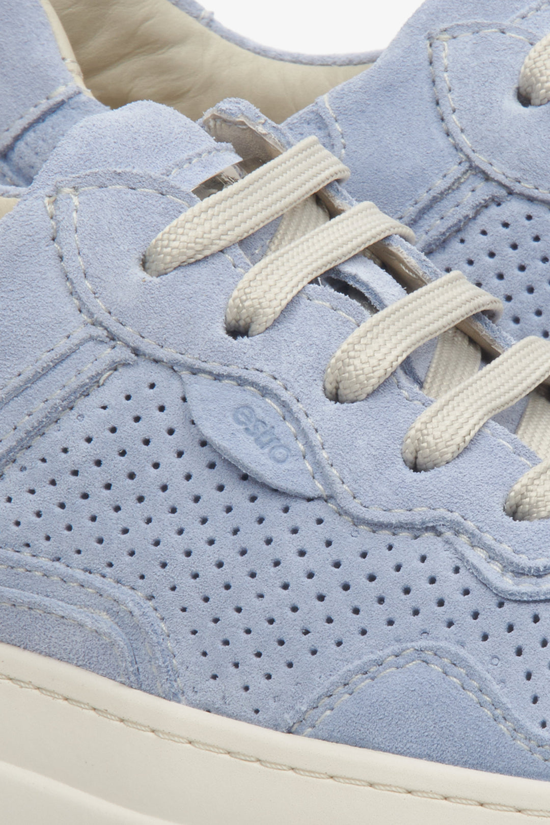 Estro women's suede sneakers in light blue with perforations for summer - close-up on details.