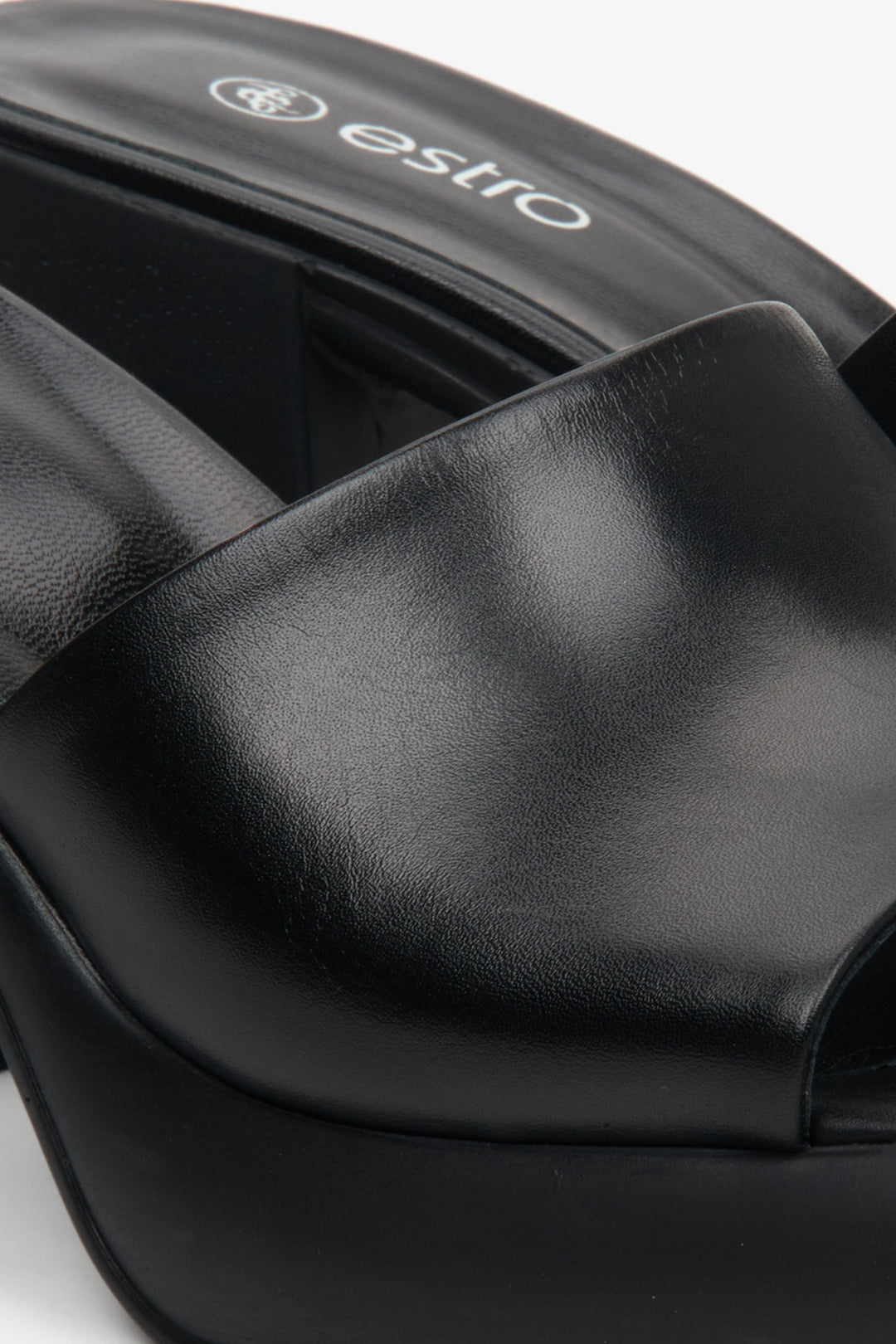 Black leather mules for women on a block heel Estro - close-up of the sewing system.