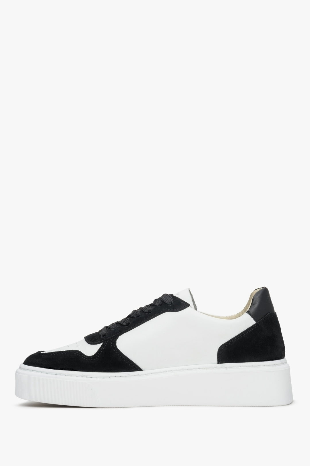 Women's sneakers made of combined materials, leather and velour in a shade of white and black.