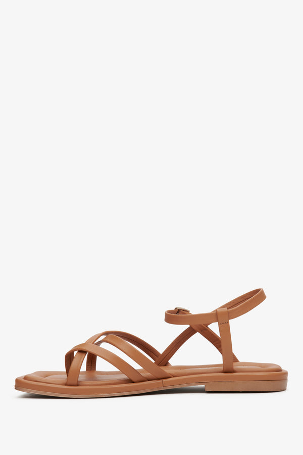 Women's leather lightweight sandals in brown with thin cross straps.