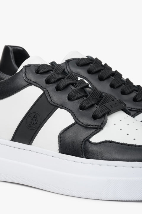 Women's natural leather lace-up sneakers in white and black - close-up on the details.