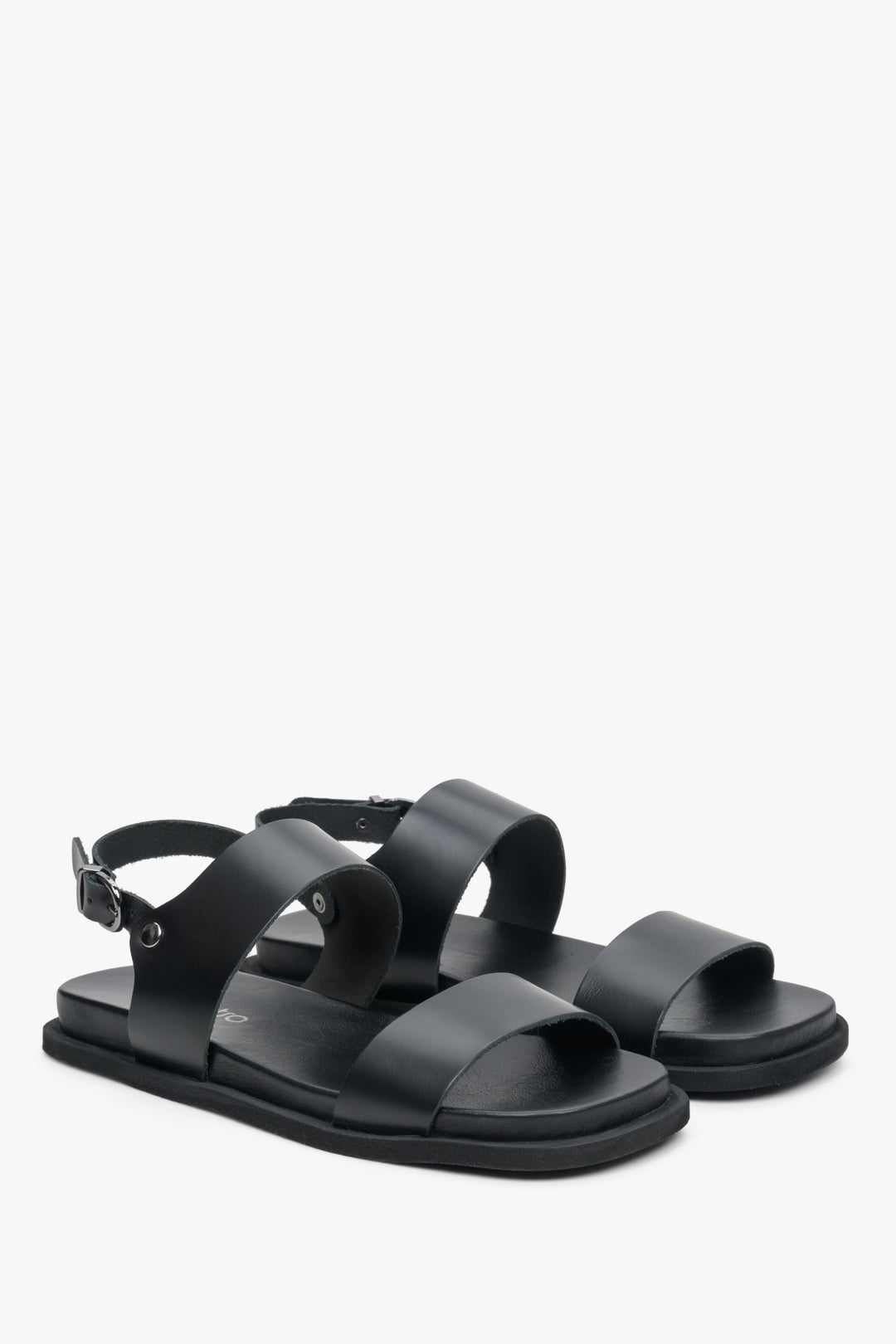 Women's black sandals on a black flat sole made of natural leather Estro.